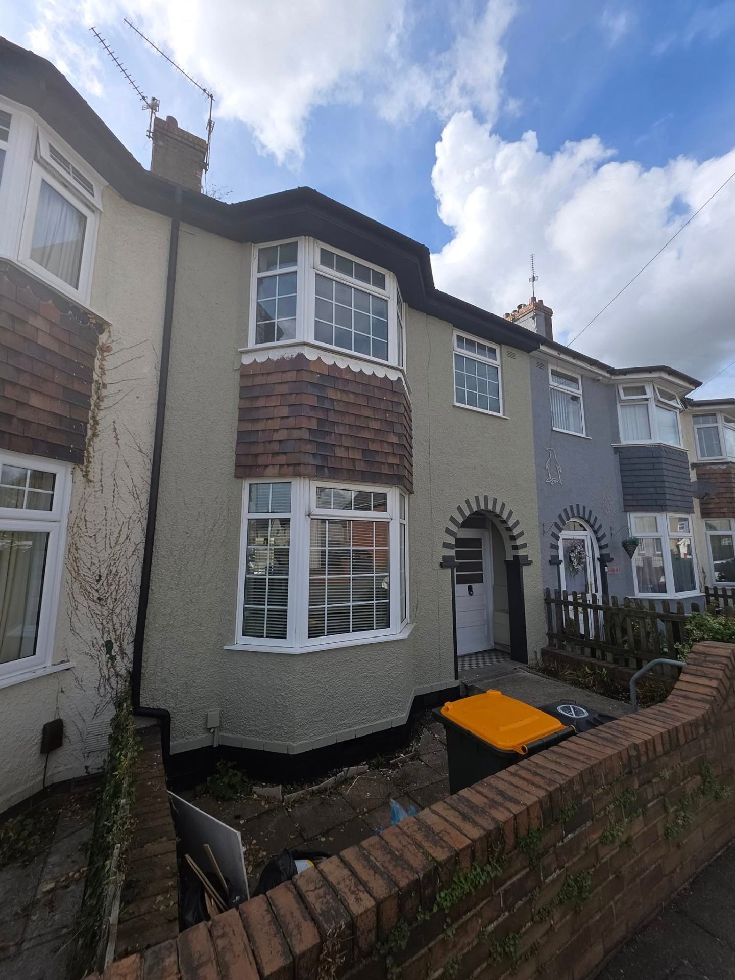 Sage-painted terrace exterior in South Wales