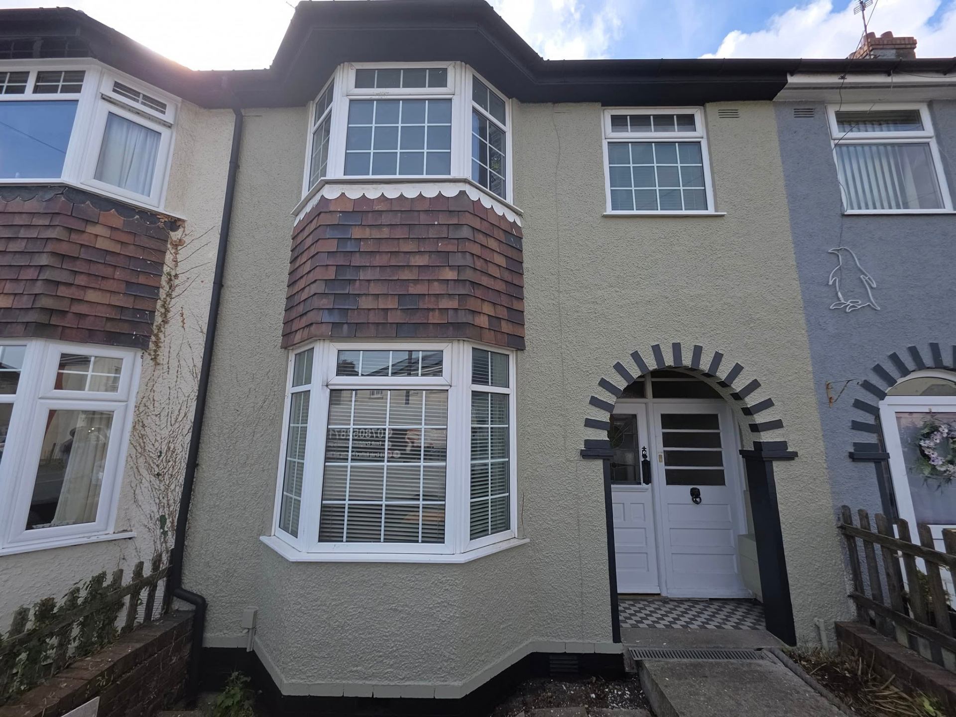 Sage terrace front elevation after a full masonry repaint