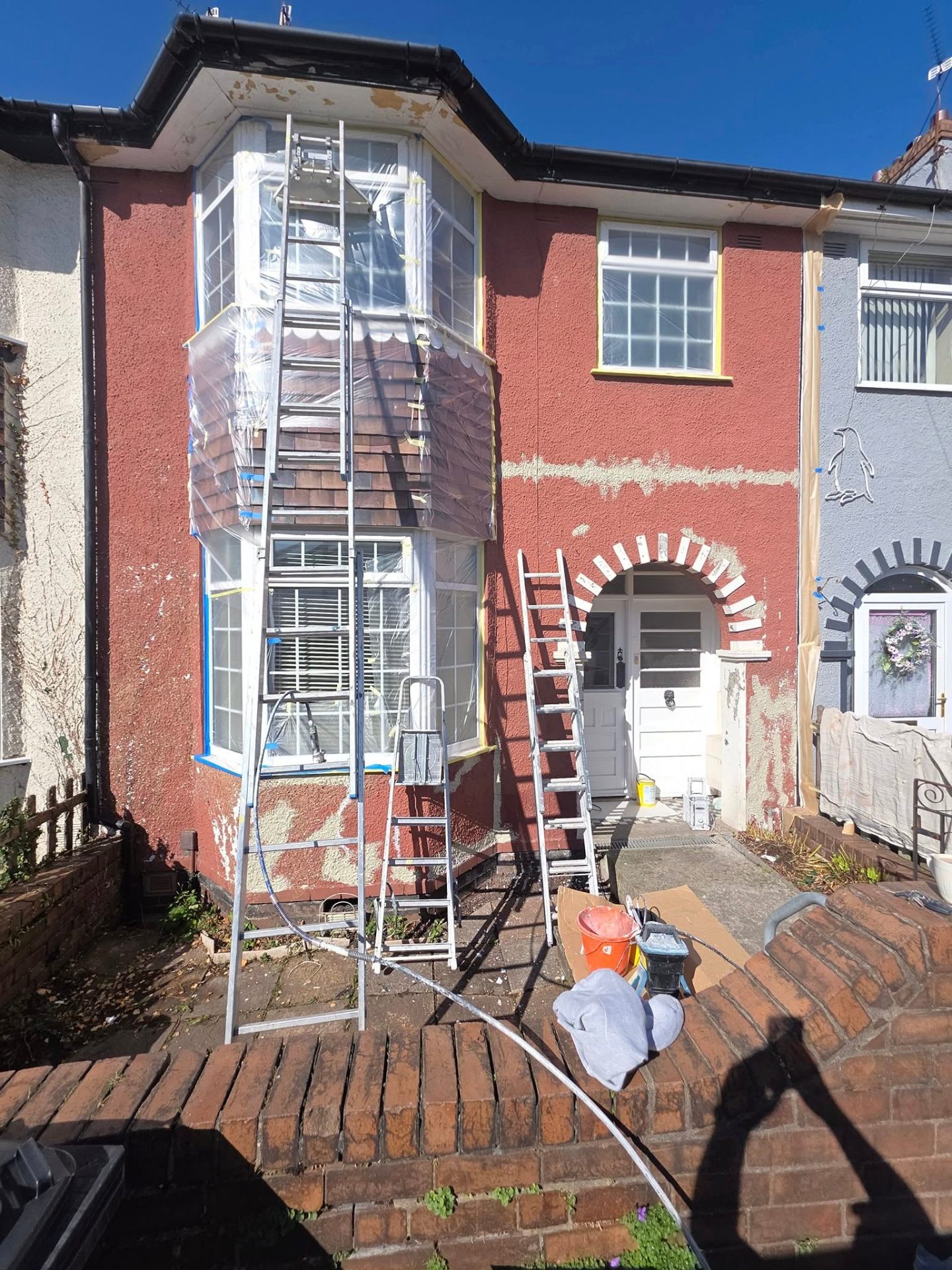 Sage terrace exterior — finished masonry and timber detailing