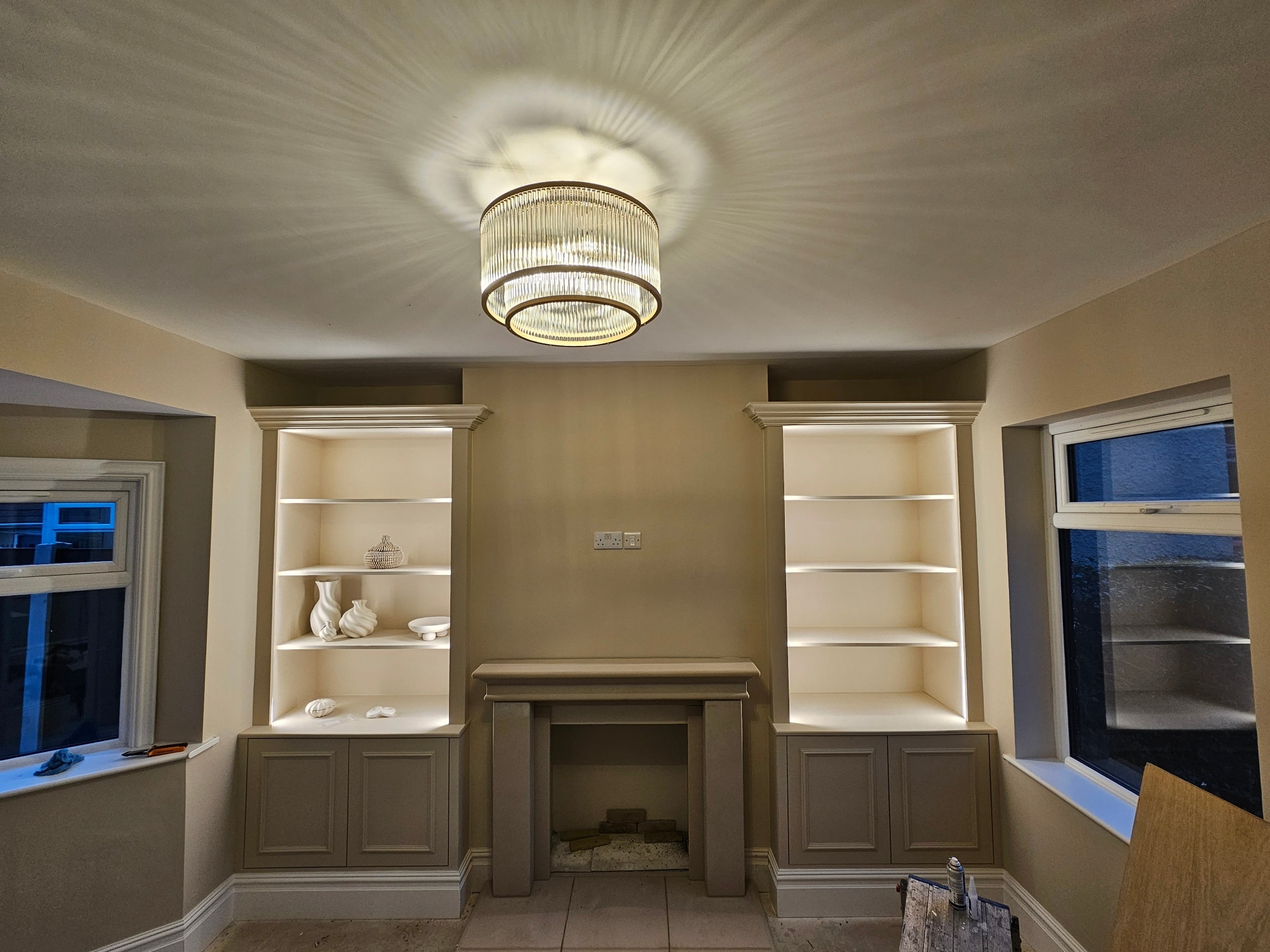 Modern staircase with black handrail and white spindles as feature