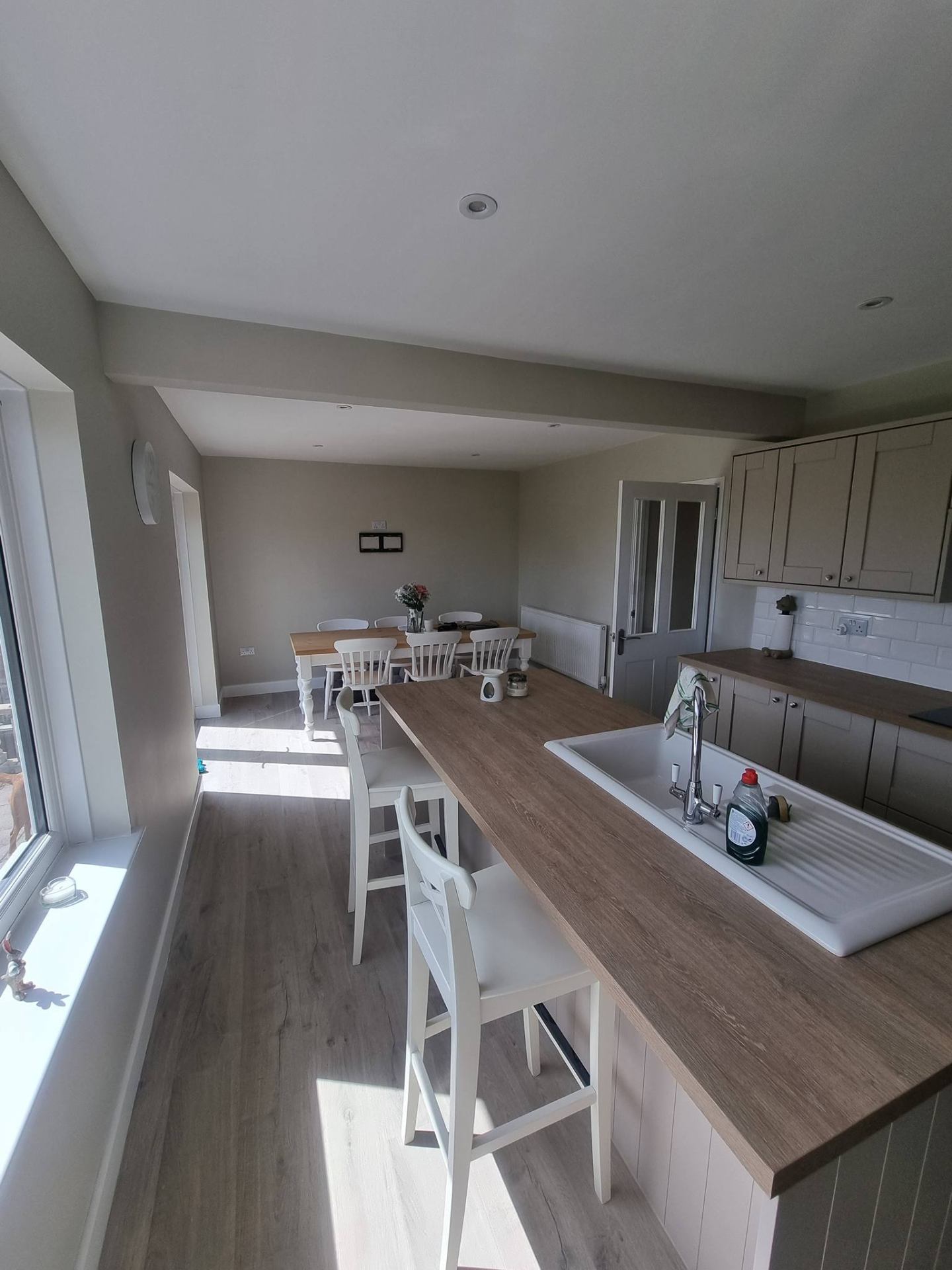 Property refresh — cream kitchen and dining open plan