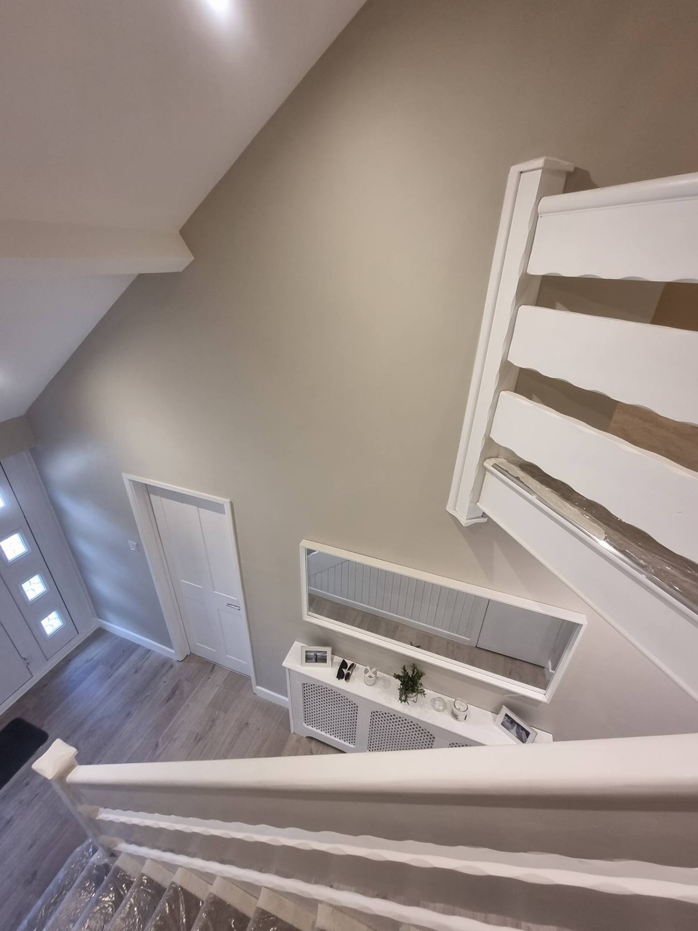 End-of-tenancy stairs and landing repainted in neutral palette