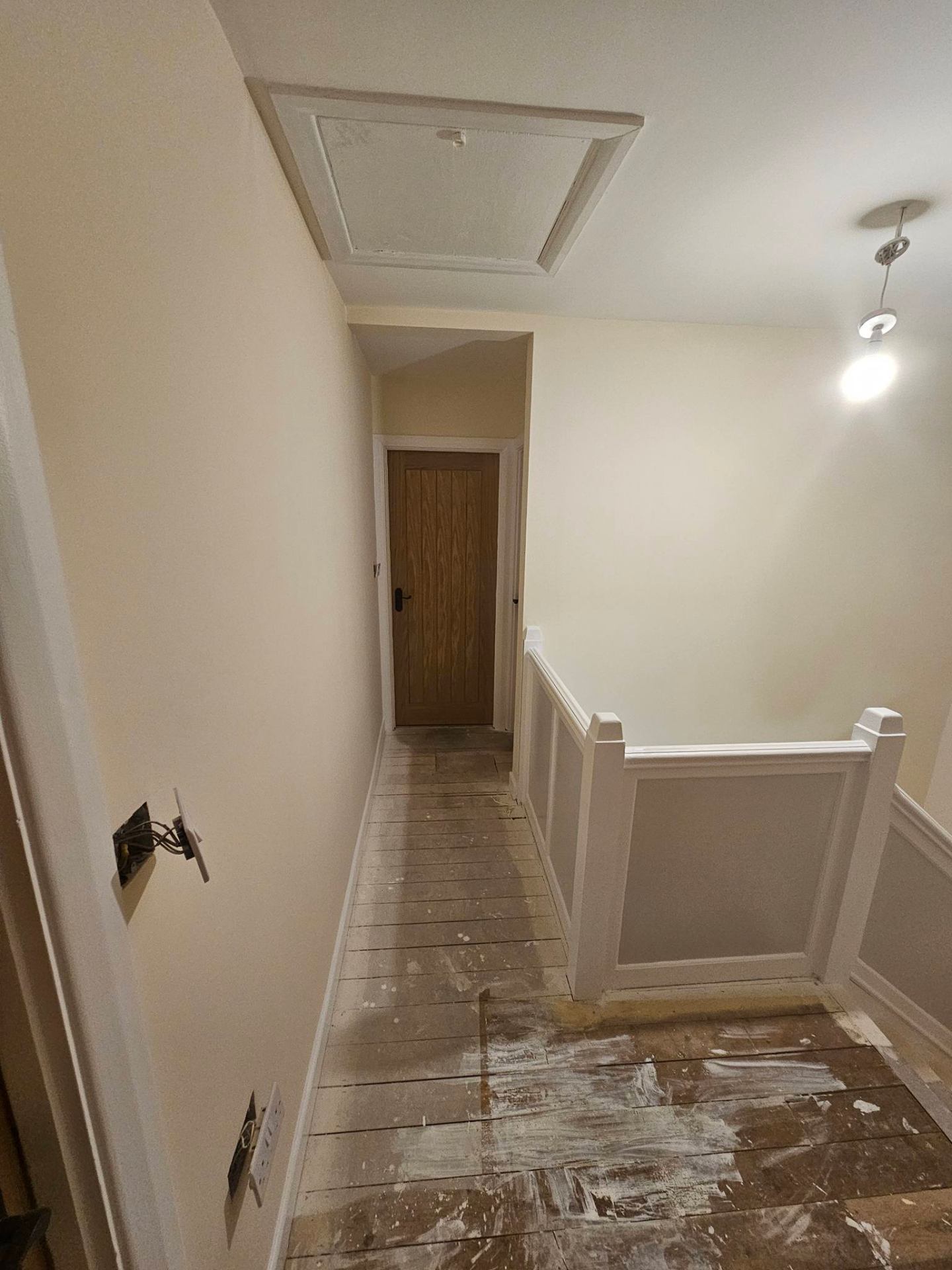Painted hallway showing sharp lines on skirting and architrave
