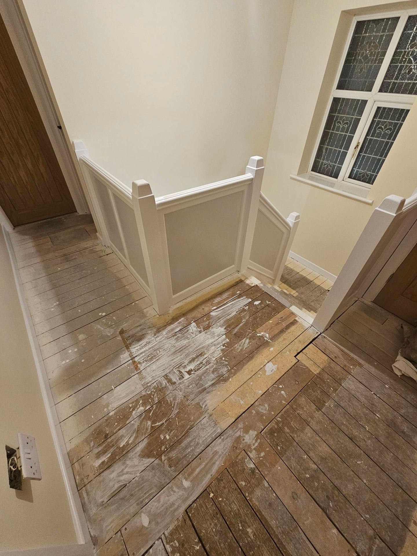 White panelled stairwell with cut-in detail