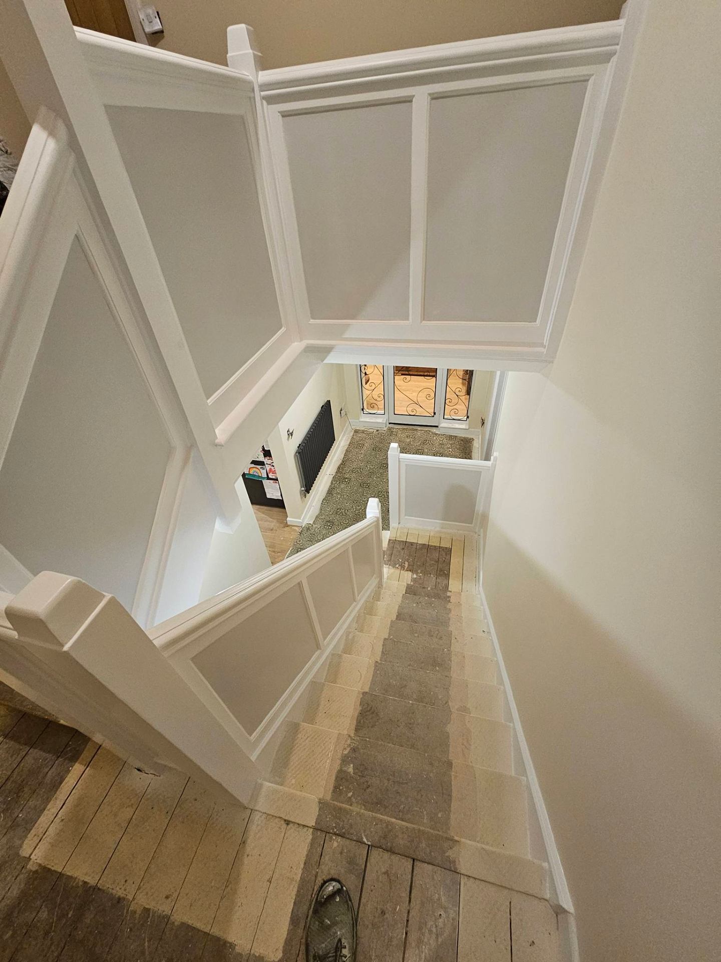 Maintained stairwell with consistent paint finish and clean lines