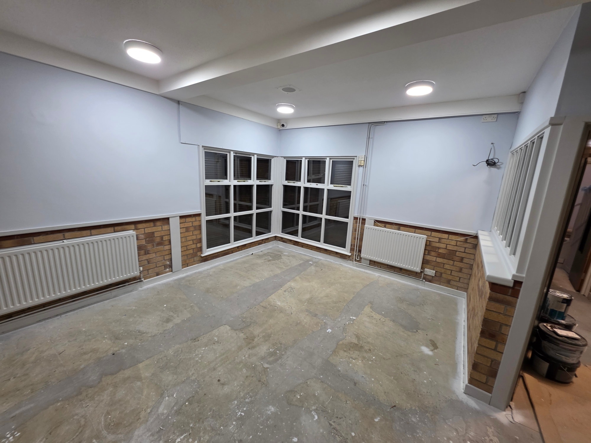 Office walls and ceiling repainted in low-VOC trade emulsion