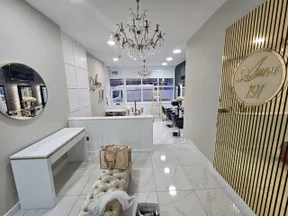 Painted retail interior — bright Newport salon shopfit decoration