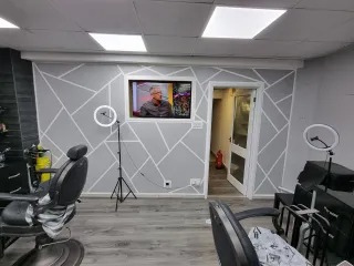 Newly painted retail interior with geometric feature wall